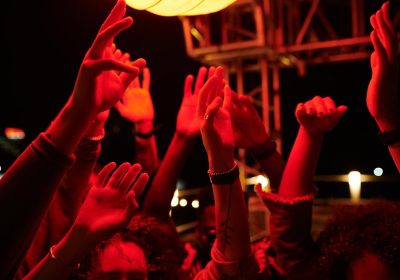 raised-hands-of-young-energetic-friends-dancing-at-2023-11-27-05-22-30-utc